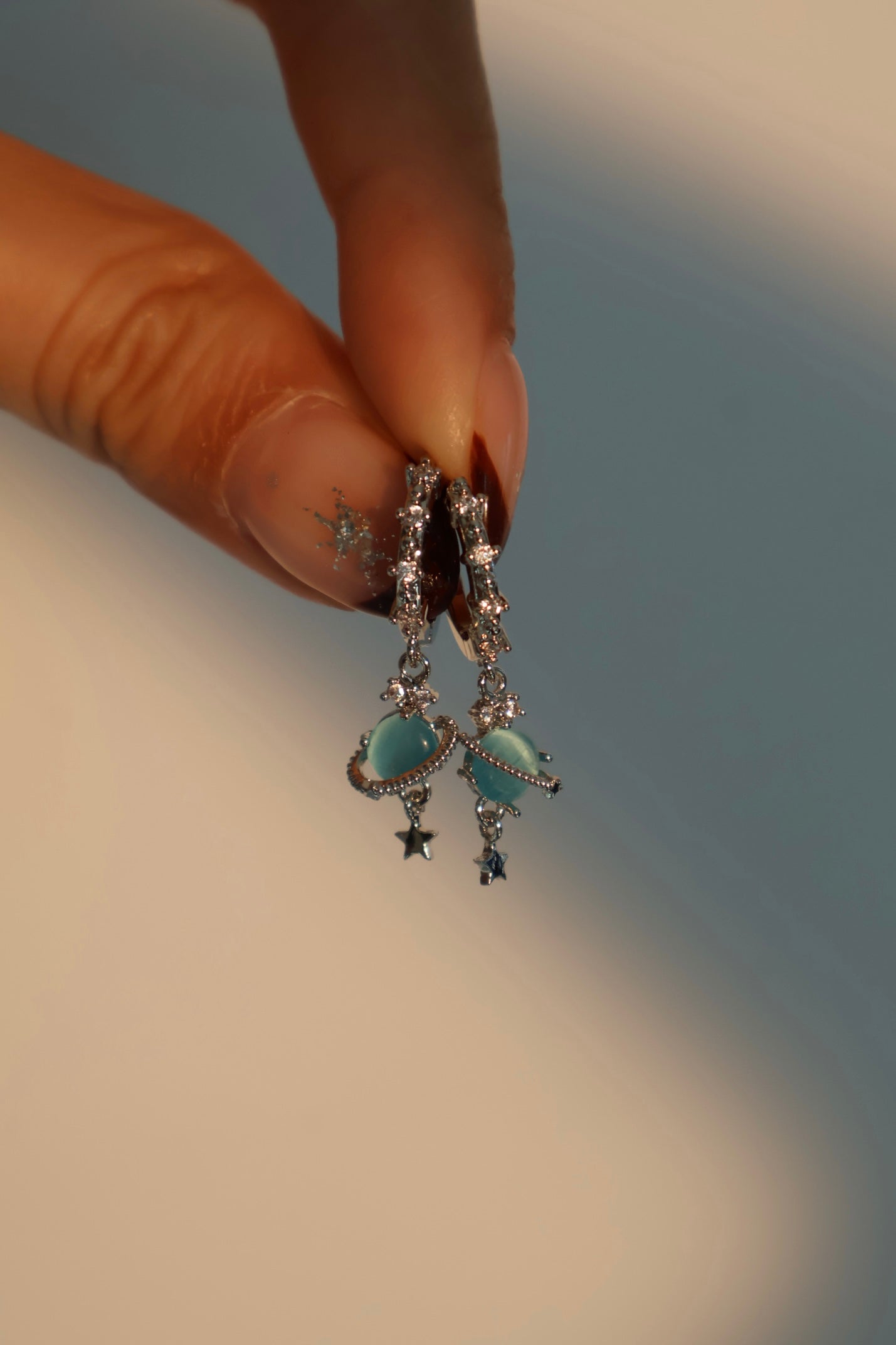 Platinum Plated Saturn Star Hoop Earrings