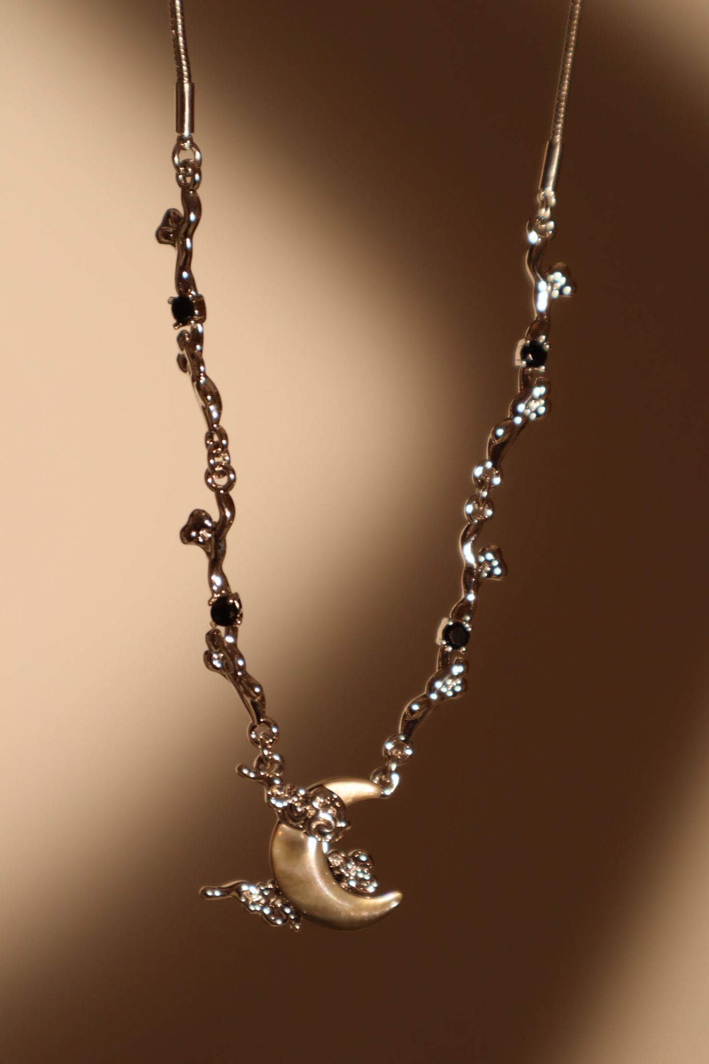 Platinum Plated Black Shell Moon Necklace