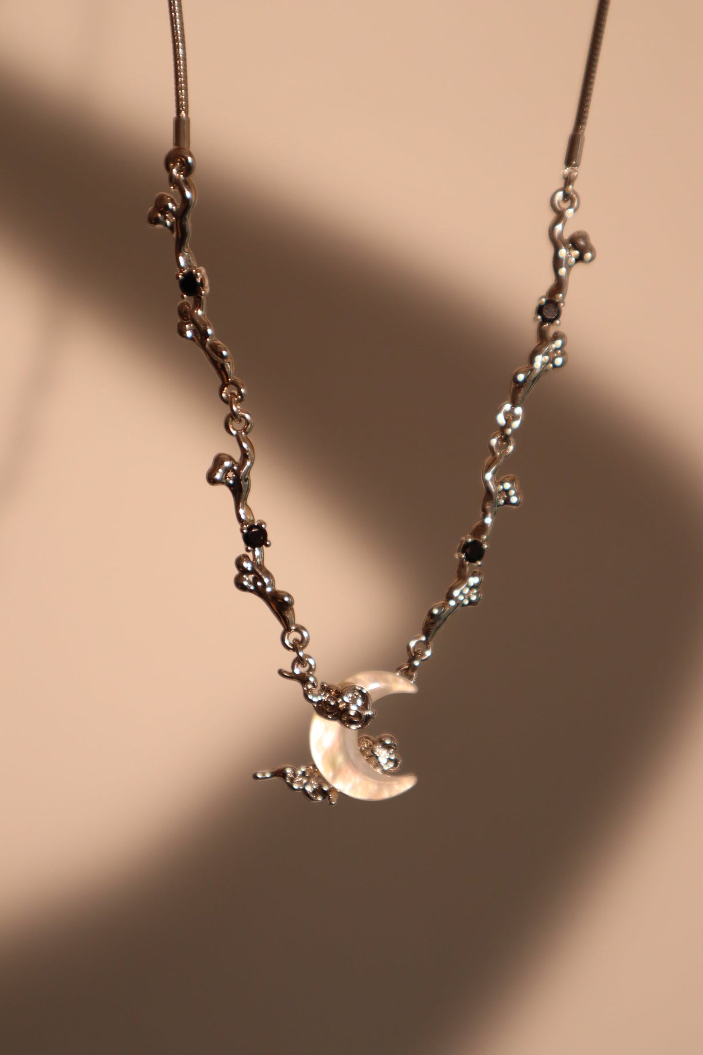 Platinum Plated Black Gem Natural Shell Moon Necklace