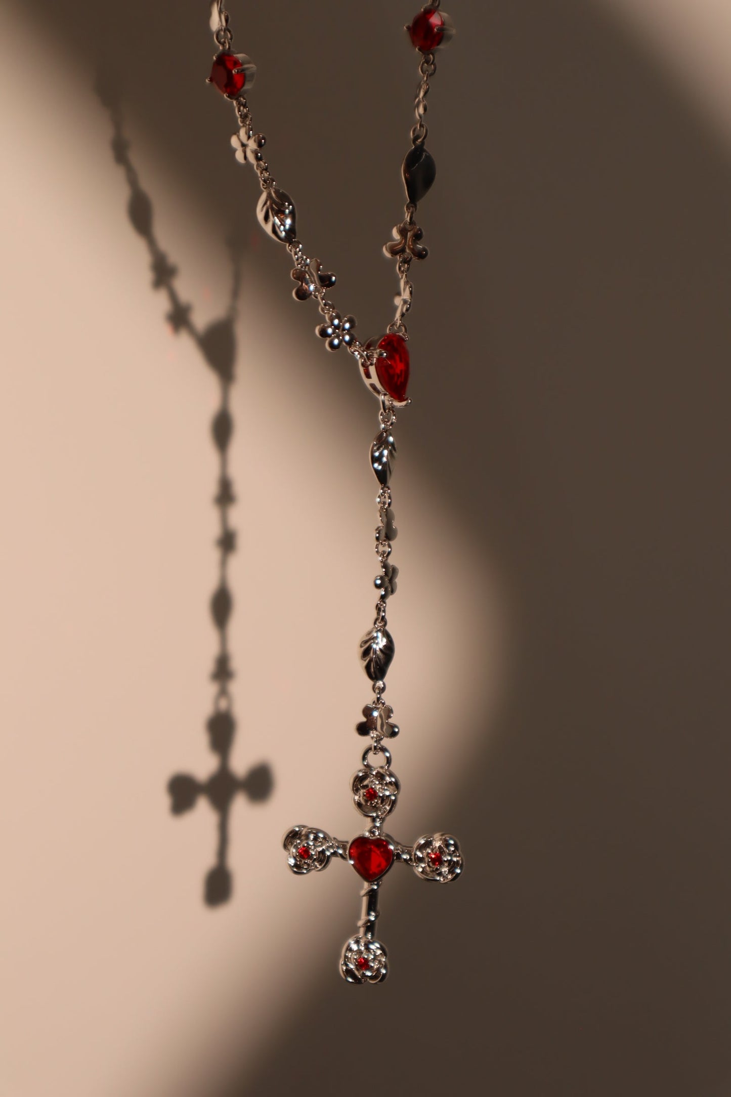 Platinum Plated Red Gem Cross Lariat Necklace