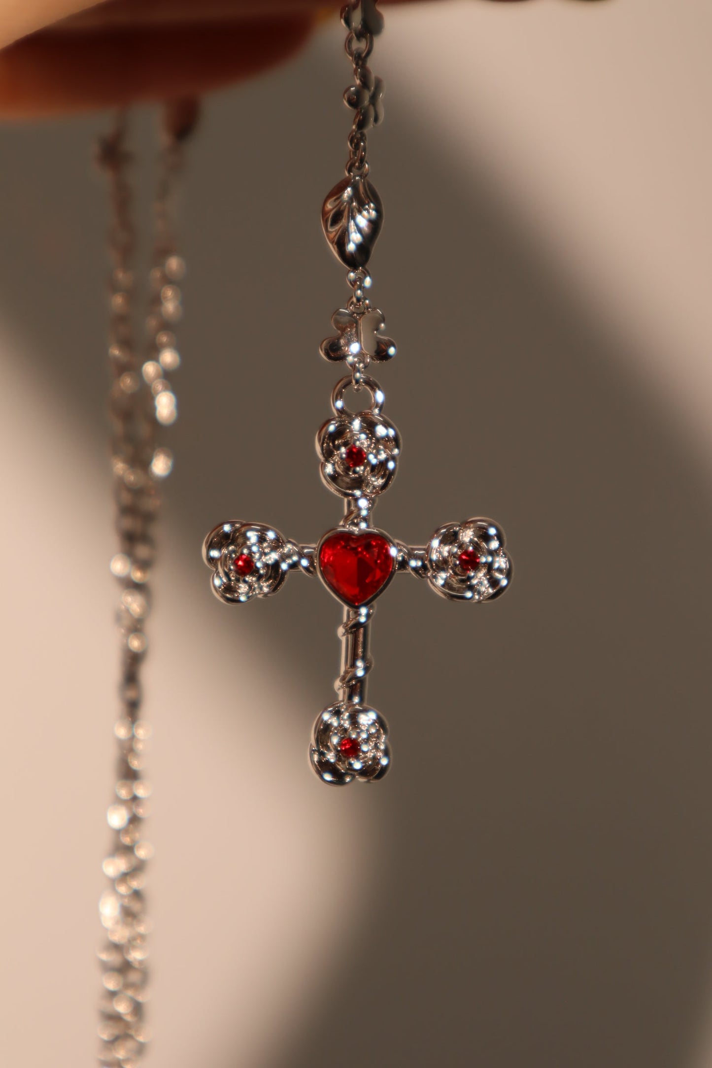 Platinum Plated Red Gem Cross Lariat Necklace