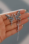 Platinum Plated Blue Gem Butterfly Earrings