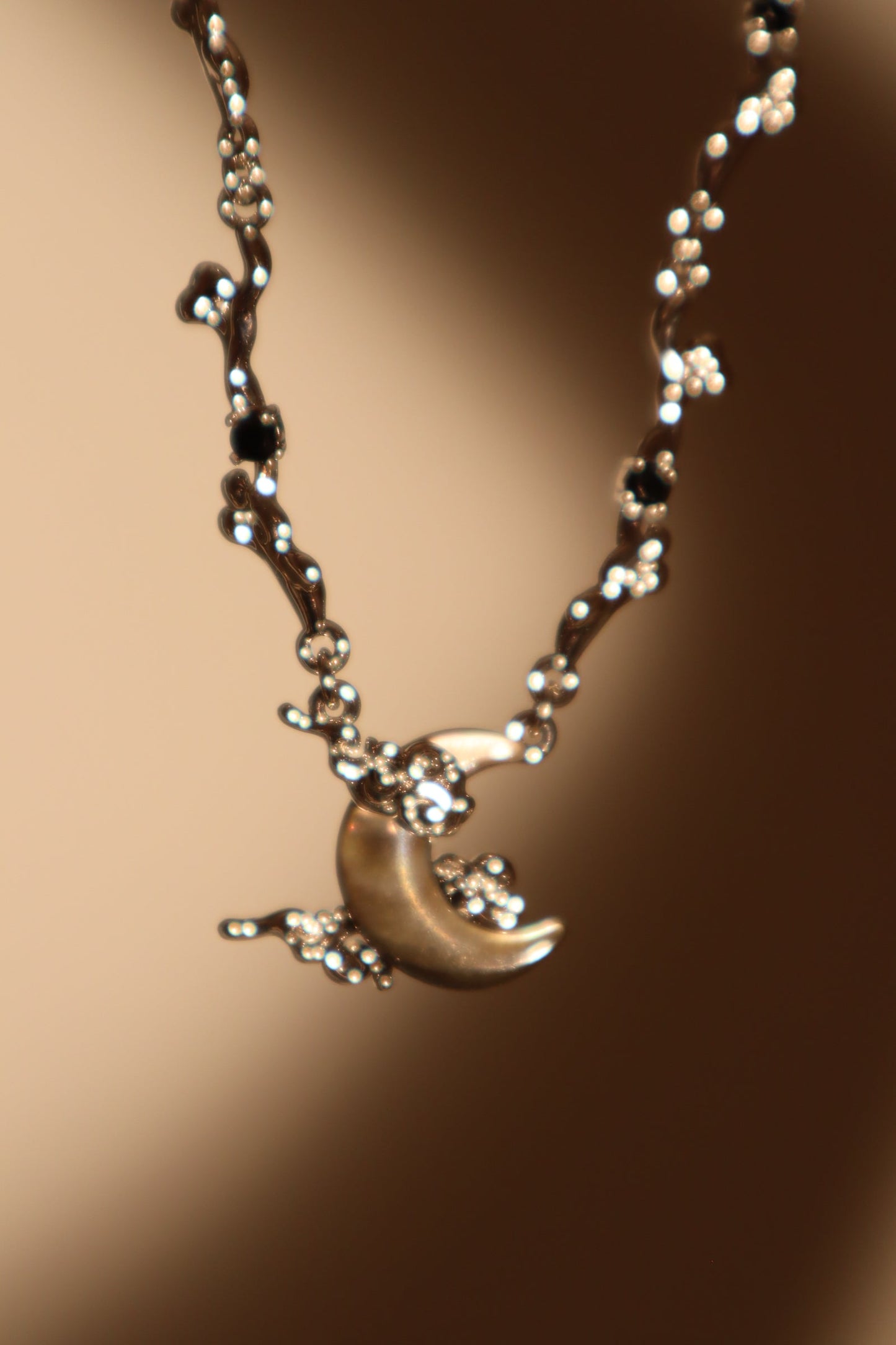 Platinum Plated Black Shell Moon Necklace