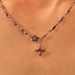 Platinum Plated Garnet Diamond Cross Necklace