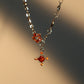 Platinum Plated Garnet Diamond Cross Necklace