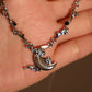 Platinum Plated Black Shell Moon Necklace