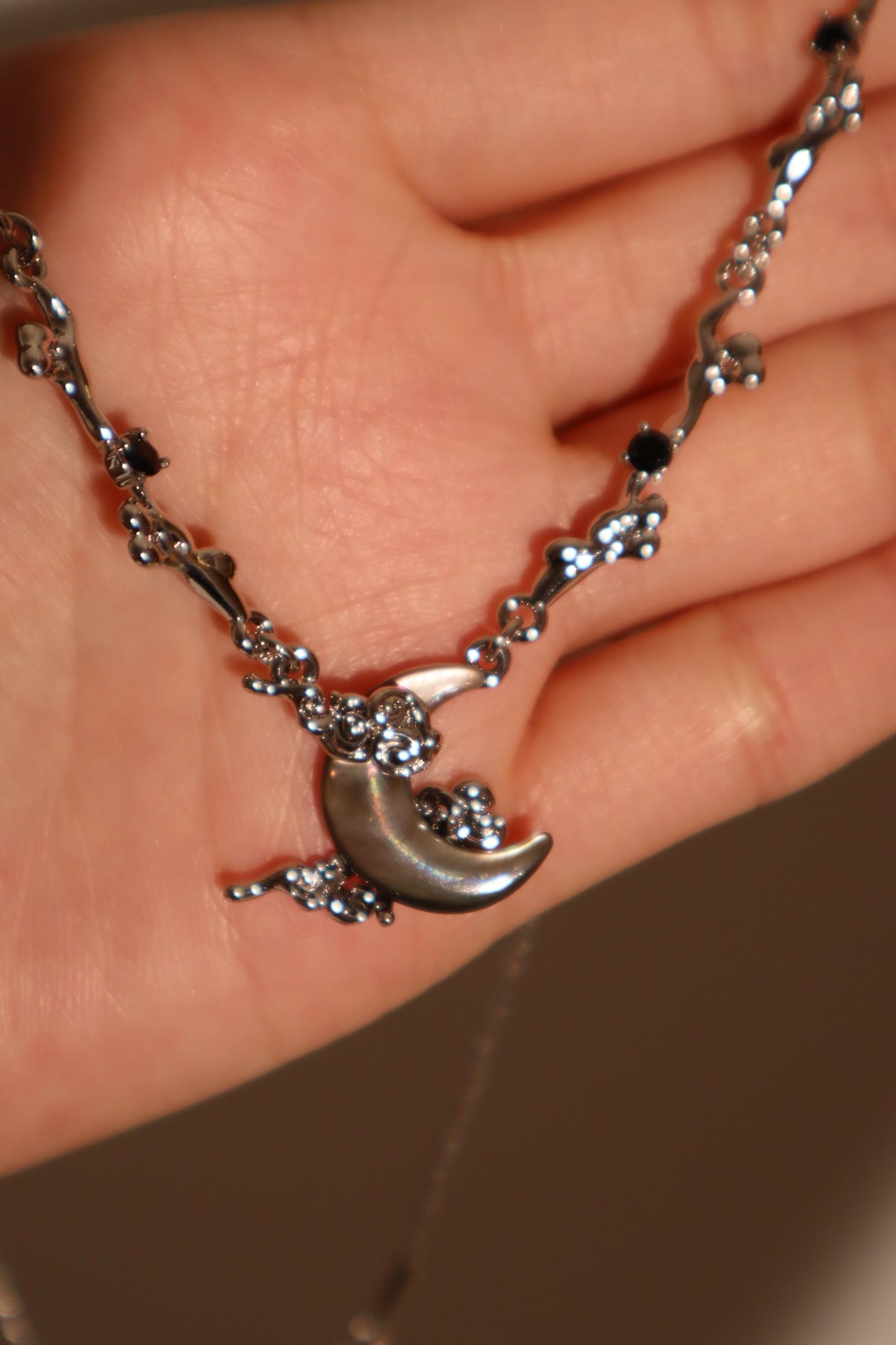 Platinum Plated Black Shell Moon Necklace