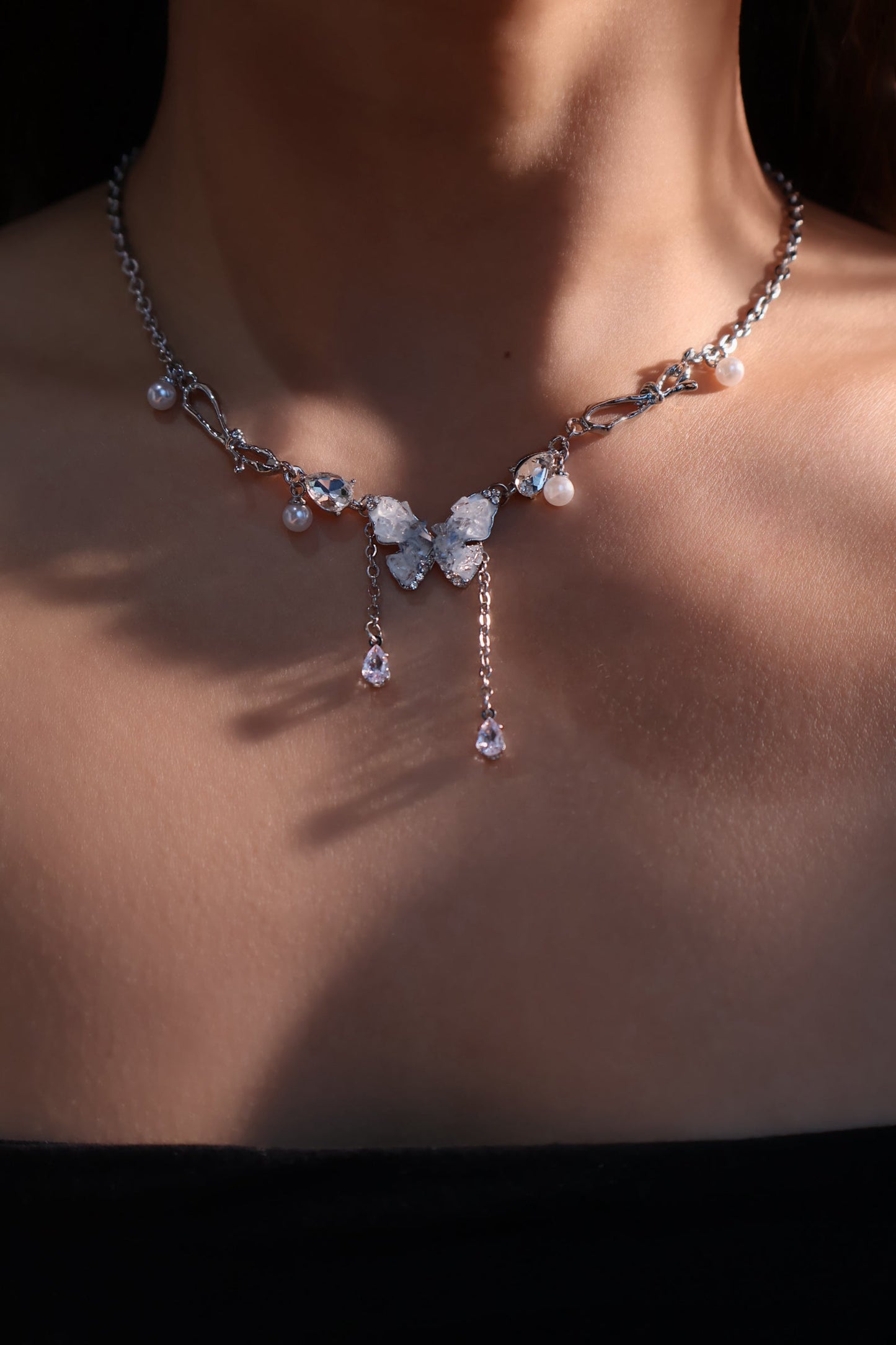 Platinum Plated Blue Crystal Butterfly Necklace