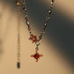 Platinum Plated Garnet Diamond Cross Necklace