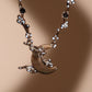 Platinum Plated Black Shell Moon Necklace