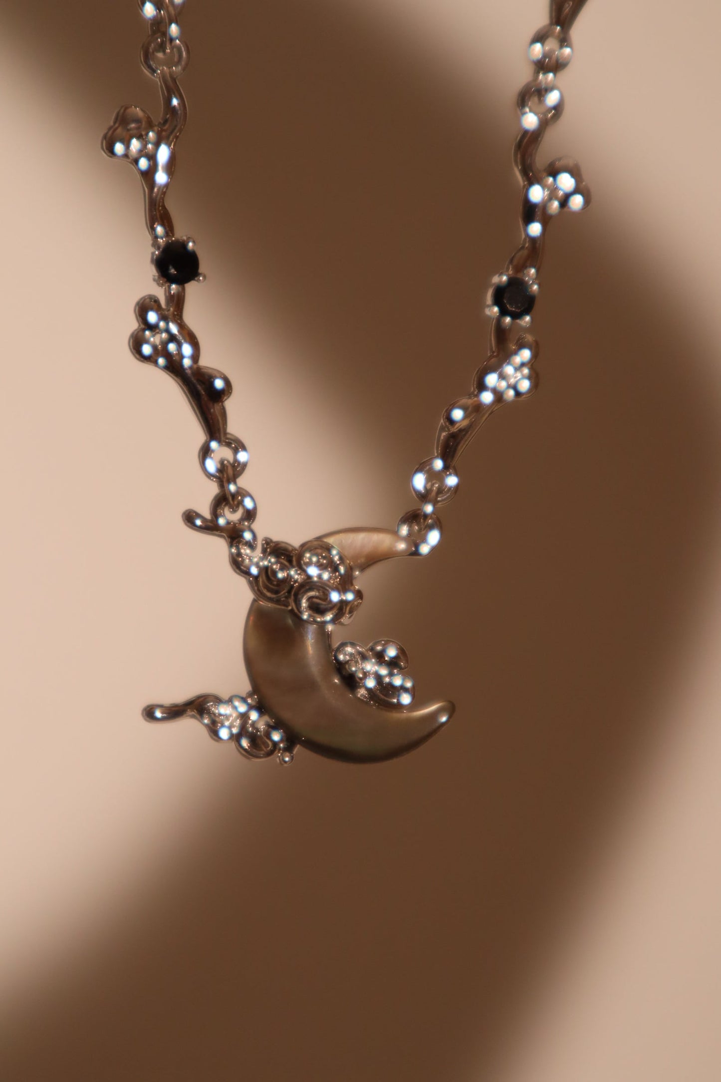Platinum Plated Black Shell Moon Necklace