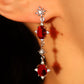 Red Gem Pole Star Earrings
