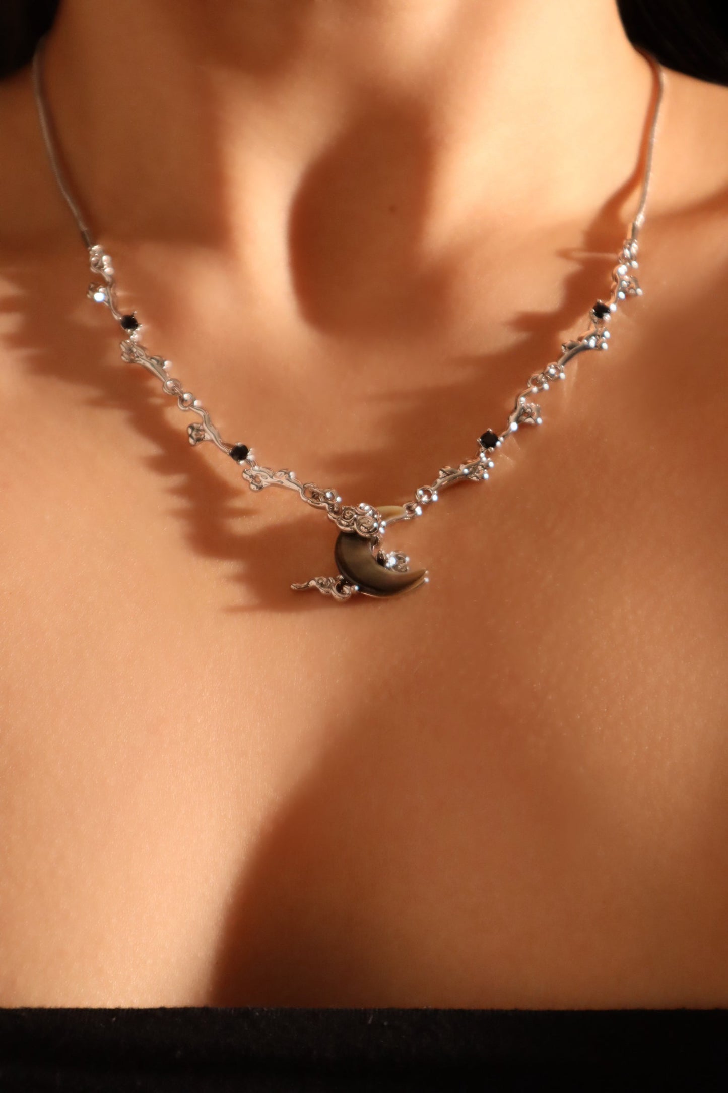 Platinum Plated Black Shell Moon Necklace
