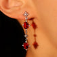 Red Gem Pole Star Earrings