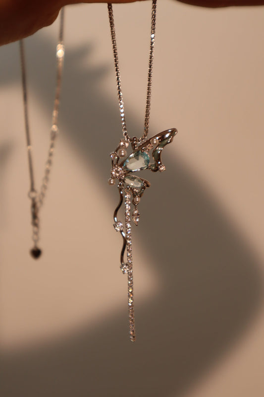Platinum Plated Blue Gem Butterfly Necklace