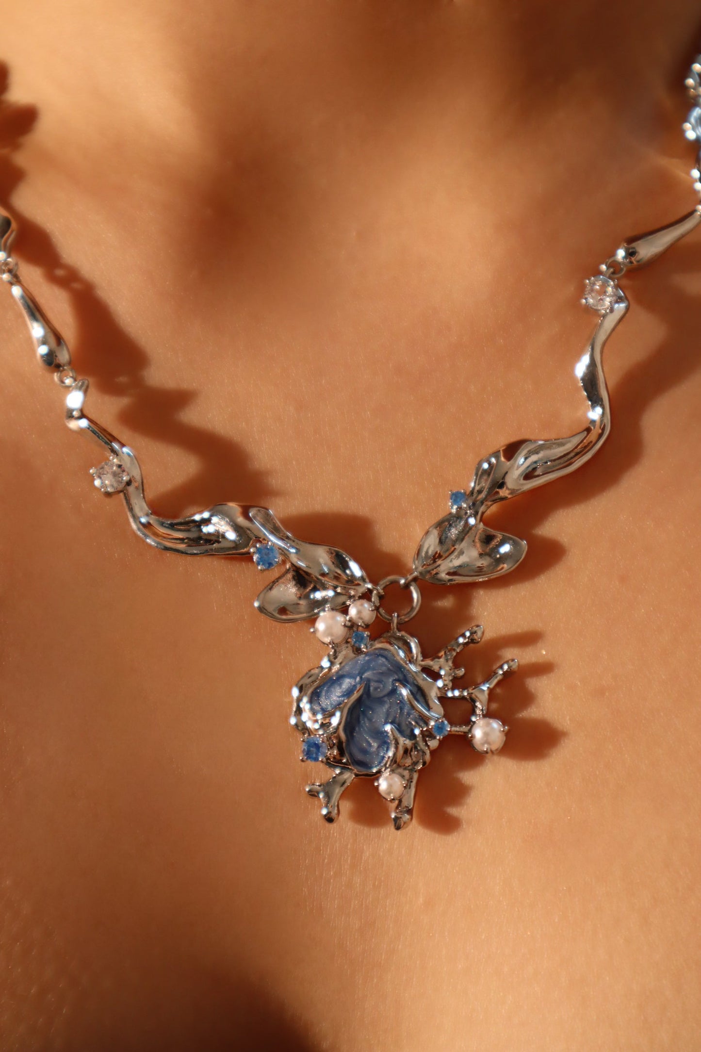 Platinum Plated Blue Shell Necklace
